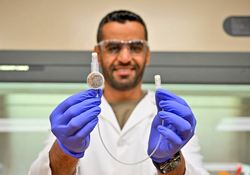 Majid Al-qurahi, Voiland School of Chemical Engineering and Bioengineering, displays an e‑catheter.