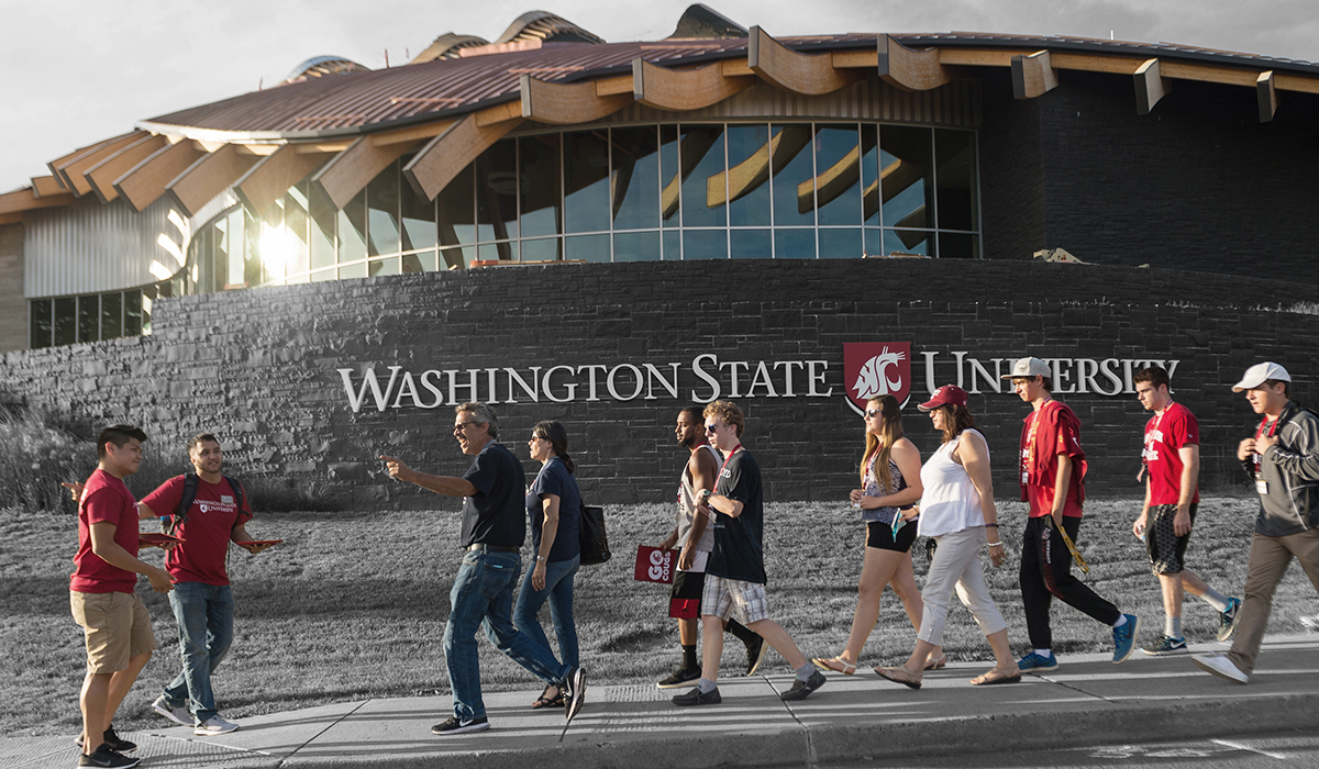 Alive! participants walk past the Elson S. Floyd Cultural Center during a campus tour